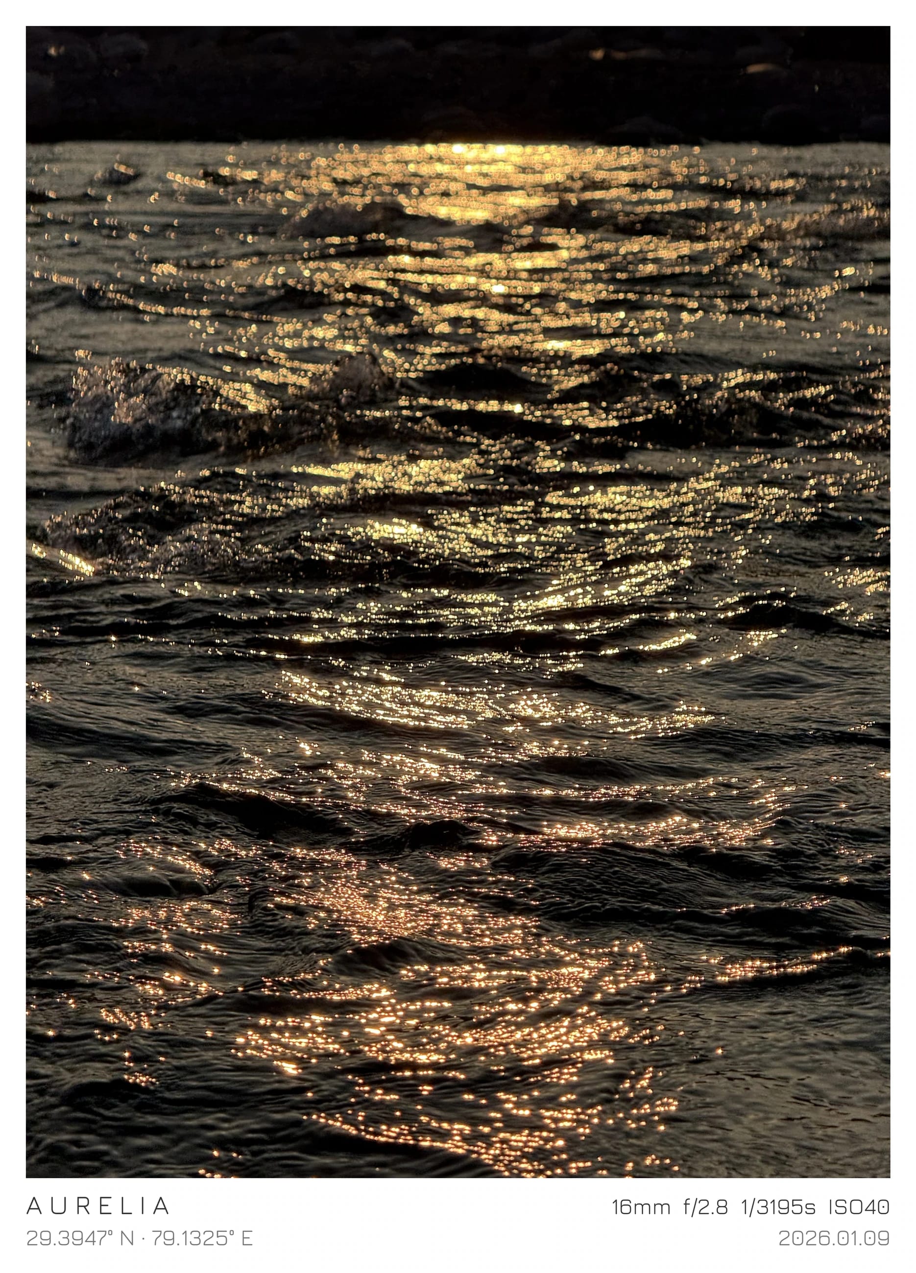 Gold light reflected in textured river water