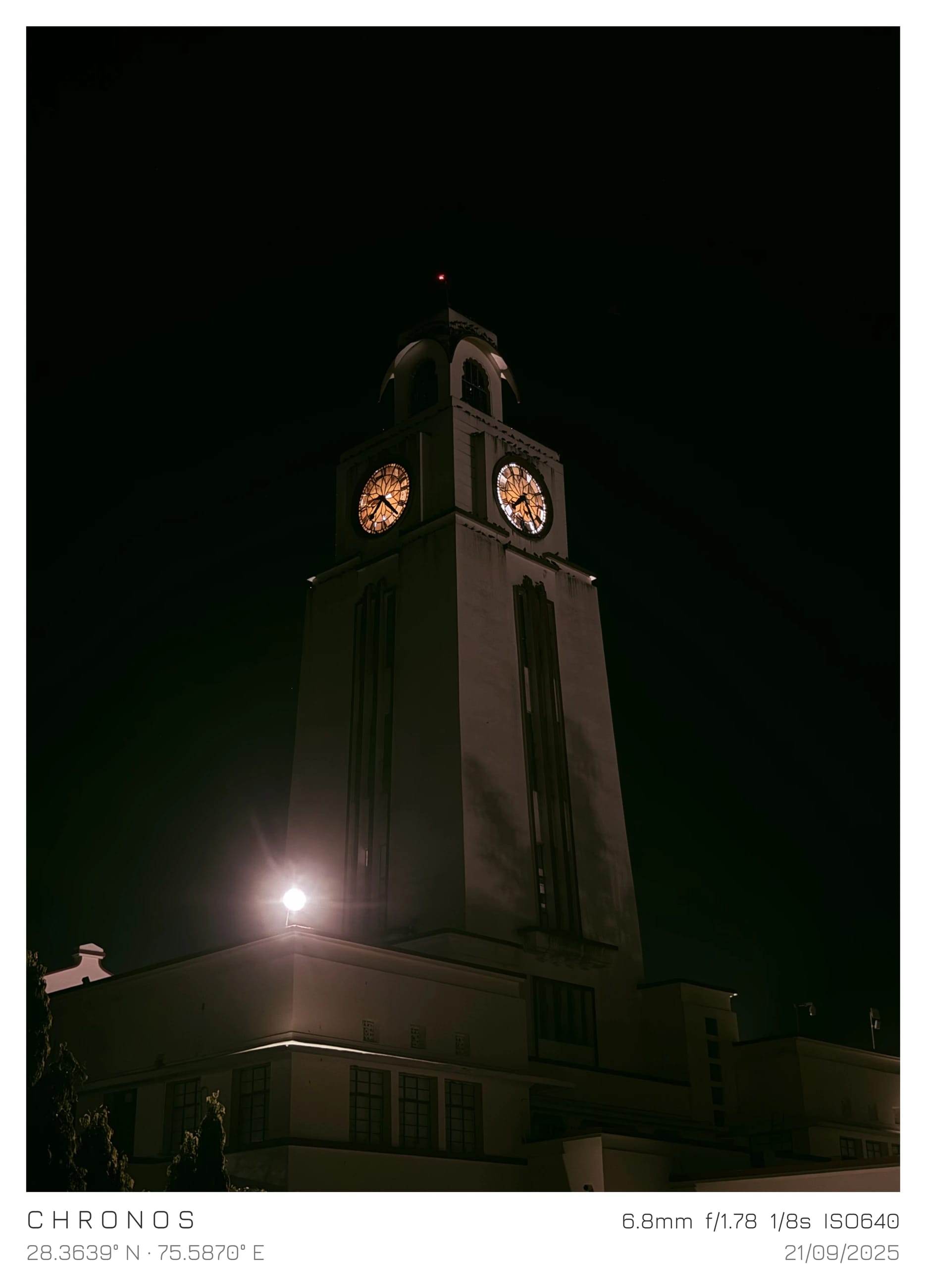 A clock tower rising from the darkness
