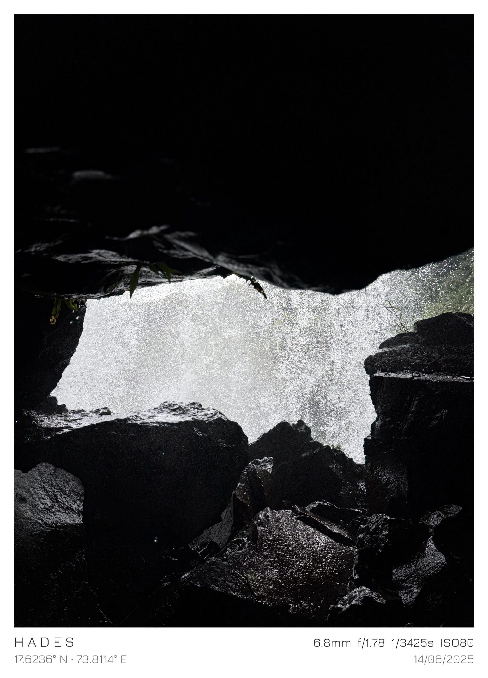 White water falling between dark rocks
